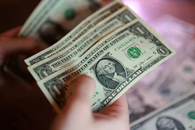 Wealthy Individuals Reduce Holdings Valued in USD